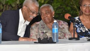 President David Granger and Ms. Carmen Jarvis share a light moment at the event at the Georgetown Club