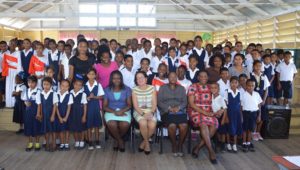 First Lady, Mrs. Sandra Granger (seated, second left) along with the teachers and students at the opening of the  Youth Development Initiative at the Lusignan Primary School.