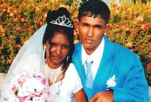 Rolun Jodmie and his wife, Tarmattie Kumar on their wedding day