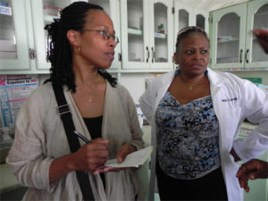 Margaret Larkins-Pettigrew, MD (right), and Tia Melton, MD, listen as a needs assessment is completed at Georgetown Public Hospital in January 2012. Drs. Larkins-Pettigrew and Melton started the Women, Neonates, Diversity, Outreach, Opportunities and Research program (known as WONDOOR and pronounced one door) at UH MacDonald Women’s Hospital to train Ob/Gyn residents in global health