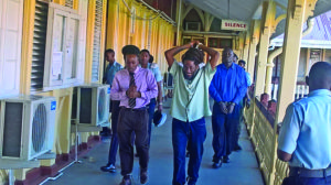 The three accused heading to court for the afternoon session on Wednesday