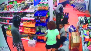 Masked cutlass and gun brandishing bandits held customers hostage in a brazen robbery caught on CCTV footage at the Good Life Supermarket at Belvedere Village, Corentyne, Berbice as they terrorised and robbed the owners and customers 