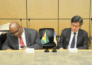 Minister of Finance, Winston Jordan and President of the Inter-American Development Bank, Luis Alberto Moreno signing one of the agreements at the hemispheric bank’s Washington DC headquarters.