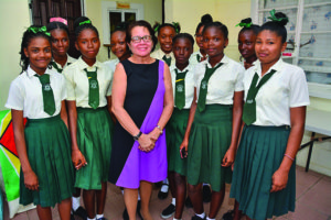 First Lady Sandra Granger poses with some Grade Nine students enrolled at the Agricola Practical Instruction Centre