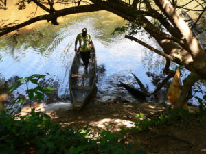 Arriving in a canoe at Carahaa Landing camp (Photo by Jay Seedy)