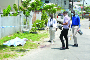 Investigators at the crime scene 